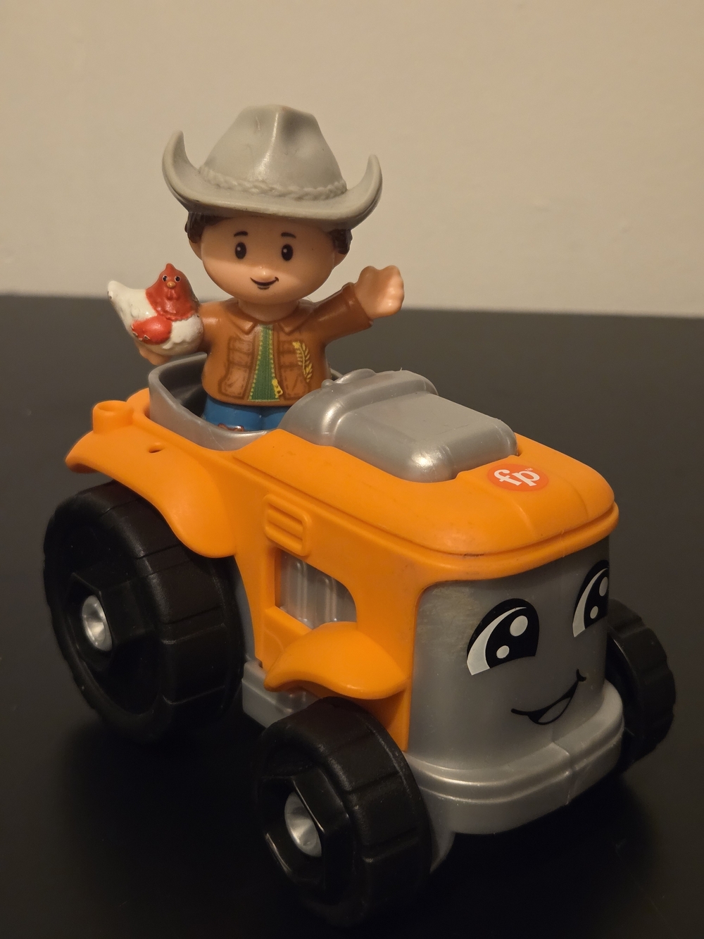 Little People Farmer Holding Chicken With Orange Tractor